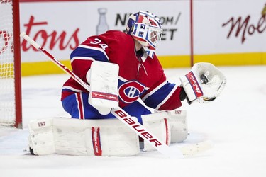 Jake Allen makes a trapper save during second-period action in Montreal on Monday May 3, 2021.