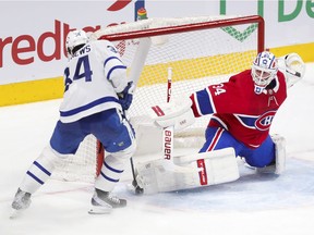 Montreal Canadiens' Jake Allen stops Toronto Maple Leafs' Auston Matthews on a breakaway during overtime in Montreal on May 3, 2021.