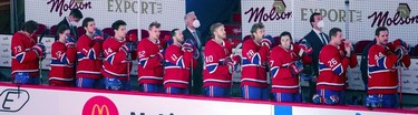 Montreal Canadiens stand for the national anthem prior to their game against the Edmonton Oilers in Montreal on Monday, May 10, 2021.  It was the first time in the team's history that it didn't have a Quebec-born francophone player in the lineup.