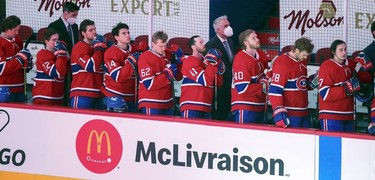Montreal Canadiens stand for the national anthem prior to their game against the Edmonton Oilers in Montreal on Monday May 10, 2021.  It was the first time in the team's history that it didn't have a Quebec-born francophone player in the lineup.