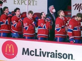 Montreal Canadiens stand for the national anthem prior to their game against the Edmonton Oilers in Montreal on Monday May 10, 2021.  It was the first time in the team's history that it didn't have a Quebec-born francophone player in the lineup.
