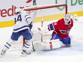 Canadiens goalie Jake Allen makes save on the Toronto Maple Leafs' Auston Matthews during game this season at the Bell Centre.