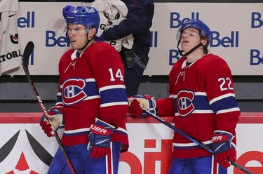 Nick Suzuki, left, and Cole Caufield are seen after the Habs after lose to the Edmonton Oilers in overtime in Montreal on Wednesday, May 12, 2021.