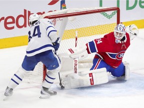 Montreal Canadiens' Jake Allen stops Toronto Maple Leafs Auston Matthews on a breakaway during overtime in Montreal on May 3, 2021.