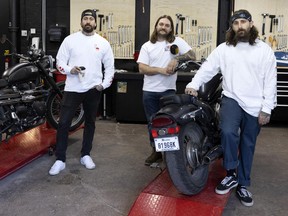 Co-owners (left to right) Dave Lechasseur, Charles-Elie Dumontier, and Mikey Rose at Idle Garage & Coffee, a new motorcycle repair garage and coffee shop in Montreal.