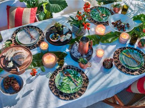 Tabletop accessories help to create a getaway meal in your own backyard. Leaf Print melamine plates, set of 4, $15, HomeSense