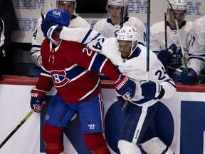 Toronto Maple Leafs forward Wayne Simmonds gives Canadiens defenceman Jon Merrill a face wash during Game 3 of playoff series Monday night at the Bell Centre. The Leafs won the game 2-1.