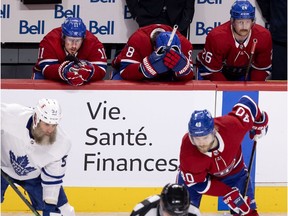 Montreal Canadiens, from left, Brendan Gallagher, Ben Chiarot and Jeff Petry show their disappointment in the final moments of a 4-0 loss to Toronto in Game 4 in Montreal on May 25, 2021.