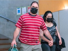 Guy Dion and Marie-Josée Viau are charged with the 2016 murders of brothers Vincenzo and Giuseppe Falduto. The couple entered the Gouin Courthouse in Montreal on Thursday May 27, 2021.