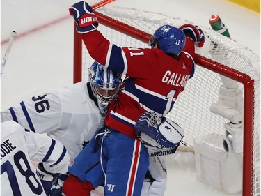 Canadiens' Brendan Gallagher (11) is manhandled away from the net by Toronto Maple Leafs goaltender Jack Campbell during second period action in Game 6 of the first round NHL playoff series in Montreal on Saturday, May 29, 2021.