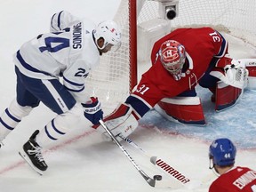 Toronto Maple Leafs' Wayne Simmonds (24) gets in close on Canadiens goaltender Carey Price during second period action in Game 6 of the first round NHL playoff series in Montreal on Saturday, May 29, 2021.
