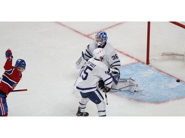 Canadiens' Jesperi Kotkaniemi (15) celebrates his game-winning goal on Toronto Maple Leafs goaltender Jack Campbell during overtime in Game 6 of the first round NHL playoff series in Montreal on Saturday, May 29, 2021.