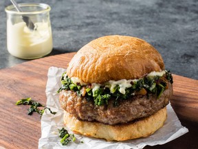 Pork burgers are complemented with rapini.