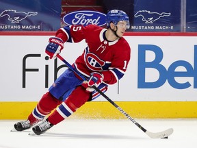 Montreal Canadiens' Jesperi Kotkaniemi turns with the puck during second period game against the Winnipeg Jets in Montreal on April 8, 2021.