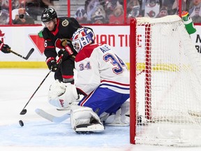 Canadiens goalie Jake Allen stymies Senators' Colin White Wednesday night at the Canadian Tire Centre  in Ottawa.