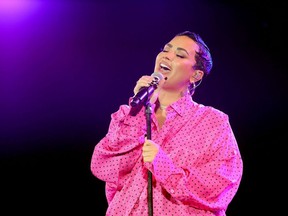Demi Lovato performs onstage during the OBB Premiere Event for YouTube Originals Docuseries "Demi Lovato: Dancing With The Devil" at The Beverly Hilton on March 22, 2021 in Beverly Hills, California.