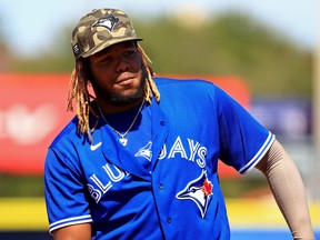 Vladimir Guerrero Jr. of the Toronto Blue Jays looks on during a game against the Philadelphia Phillies at TD Ballpark on May 16, 2021 in Dunedin, Florida.