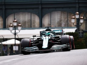 Lance Stroll of Montreal driving the (18) Aston Martin AMR21 Mercedes on track during qualifying for the F1 Grand Prix of Monaco at Circuit de Monaco on Saturday, May 22, 2021, in Monte-Carlo.
