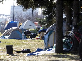 Rows of tents make up part of a homeless tent city on Notre-Dame St. in Montreal.