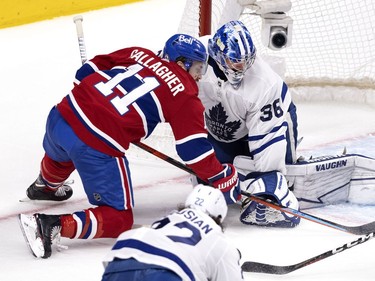 Montreal Canadiens right wing Brendan Gallagher (11) tries but fails to get around Toronto Maple Leafs goaltender Jack Campbell (36) pads during NHL playoff action in Montreal on Tuesday, May 25, 2021.