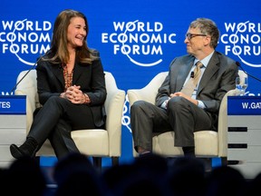 In this file photo taken on January 23, 2015, Melinda and Bill Gates attend a session at the Congress Center during the World Economic Forum (WEF) annual meeting in Davos.