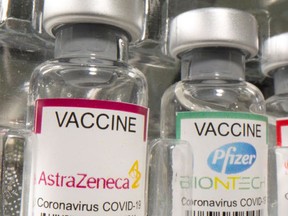 Vials of AstraZeneca and Pfizer vaccines.