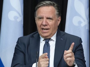 Quebec Premier François Legault responds to reporters during a news conference on the COVID-19 pandemic, Tuesday, May 25, 2021 at the legislature in Quebec City.