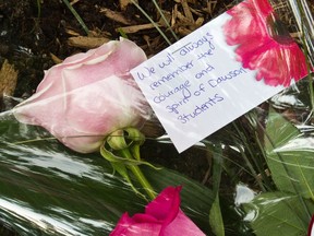 A note left at the Dawson Peace Garden during its inauguration in 2011, five years after a gunman killed Anastasia De Sousa and wounded 19 others at the college.