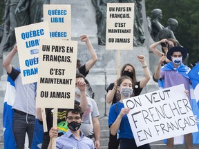 Marchers take part in a demonstration to protect the French language in Montreal.