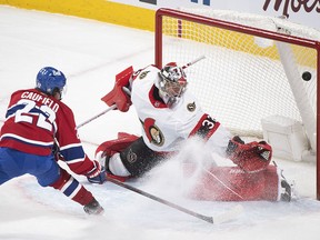 Cole Caufield scores on Ottawa Senators' goaltender Filip Gustavsson in overtime action at the Bell Centre on Saturday, May 1, 2021.