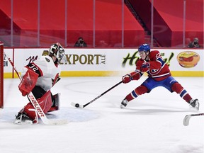 Canadiens forward Cole Caufield (22) scores the winning goal against the Ottawa Senators during the overtime period at the Bell Centre on Saturday, May 1, 2021.