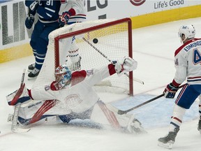 Canadiens goaltender Cayden Primeau allowed four goals on 15 shots during a difficult first period for Montreal Thursday night in Toronto.