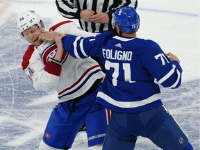 The Maple Leafs’ Nick Foligno prepares to throw punch during fight with the Canadiens’ Corey Perry during Game 1 of first-round playoff series Thursday night in Toronto.