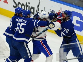 Canadiens forward Eric Staal battles with the Maple Leafs’ TJ Brodie (78), Ilya Mikheyev (65) and Zach Bogosian during Game 1 of first-round playoff series Thursday night in Toronto.