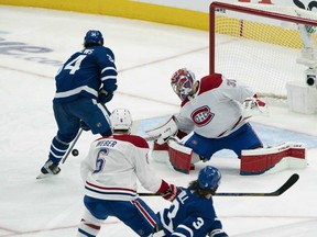 Maple Leafs centre Auston Matthews (34) scores a goal against the Canadiens during the second period in Game 2 of the first round of the 2021 Stanley Cup Playoff at Scotiabank Arena in Toronto on Saturday, May 22, 2021.