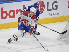 Montreal Canadiens forward Jesperi Kotkaniemi steals the puck from Toronto Maple Leafs defenceman Rasmus Sandin and moves in to score in Game 5 at Scotiabank Arena in Toronto on May 27, 2021.