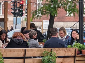 Montreal Mayor Valérie Plante was photographed with four other people on a terrasse in Plateau-Mont-Royal on Friday, May 28, 2021.