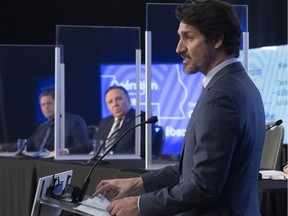 Prime Minister Justin Trudeau speaks as Premier François Legault looks on as they make an announcement March 22, 2021 in Trois-Rivières. Robert Libman says Trudeau has taken the bait in a trap his father would have seen from a mile away.