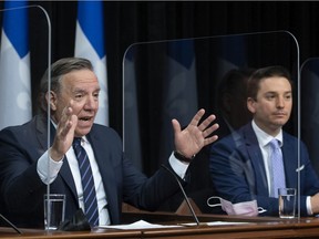 While Bill 96 includes new requirements for French services in stores, "Bonjour-Hi is not covered by the bill," said Simon Jolin-Barrette, minister responsible for the French language, right, with Premier François Legault.