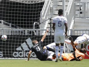 CF Montréal midfielder Djordje Mihailovic (8) reacts after scoring against the FC Cincinnati during the second half at DRV PNK Stadium in Fort Lauderdale, Fla., on May 22, 2021.