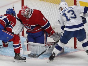 Canadiens goalie Carey Price makes save on the Tampa Bay Lightning’s Cedric Paquette during game at the Bell Centre on Jan. 2, 2020.