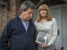 Cesur Celik and his wife June Tyler at their Île Bizard home in 2019. June holds her son's portrait taken at the University of Southern Maine. Koray Kevin Celik, 28, died on March 6, 2017 during a police intervention at his parents' home.