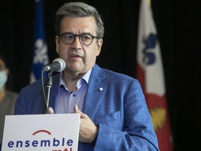 Sometimes "you have to protect people from themselves," says Denis Coderre, seen at a press conference on May 14.