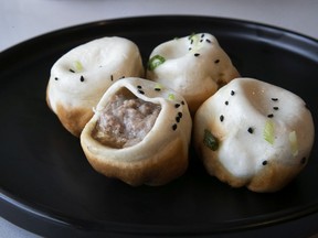 Pan-fried shengjian bao stuffed with pork from the Shanghai stylings of restaurant Chef Lee in Shaughnessy Village.