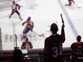 A young fan cheers on the Canadiens at the Bell Centre during warmup before Game 3 against the Winnipeg Jets Sunday night.