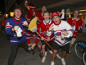 Montreal Canadiens fans had their brooms out outside the Bell Centre after the Canadiens' four-game sweep of the Winnipeg Jets following the NHL playoff game in Montreal June 7, 2021.