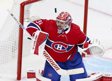 A shot by Winnipeg Jets' Logan Stanley gets past Carey Price for a goal during second period in Montreal Monday, June 7, 2021.