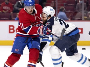 Winnipeg Jets defenceman Derek Forbort crashes face first into Montreal Canadiens right-wing Brendan Gallagher during Game 4 in Montreal on June 7, 2021.