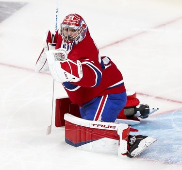 Carey Price watches a Winnipeg Jets shot go wide of the net during third period in Montreal Monday, June 7, 2021.