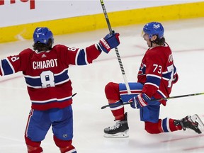 Canadiens' Tyler Toffoli celebrates his game- and series-winning goal with teammate Ben Chiarot Monday night at the Bell Centre, as the Habs beat the Jets 3-2 to complete a four-game sweep.